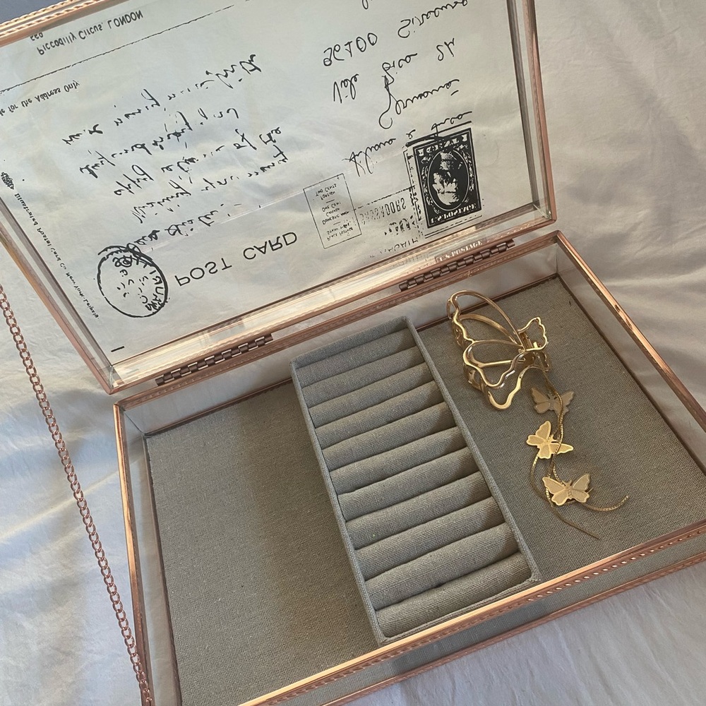 Gold clear jewelry box with buttery hair clip